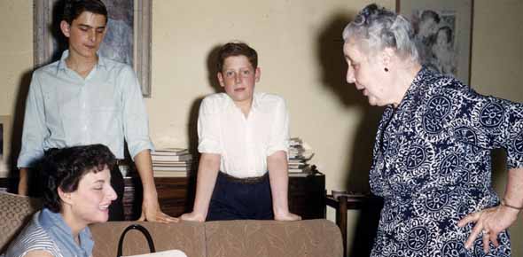 Melanie Klein serving tea in her consulting room at the Tavistock Clinic in London to me (center), my brother, and my mother in 1957.